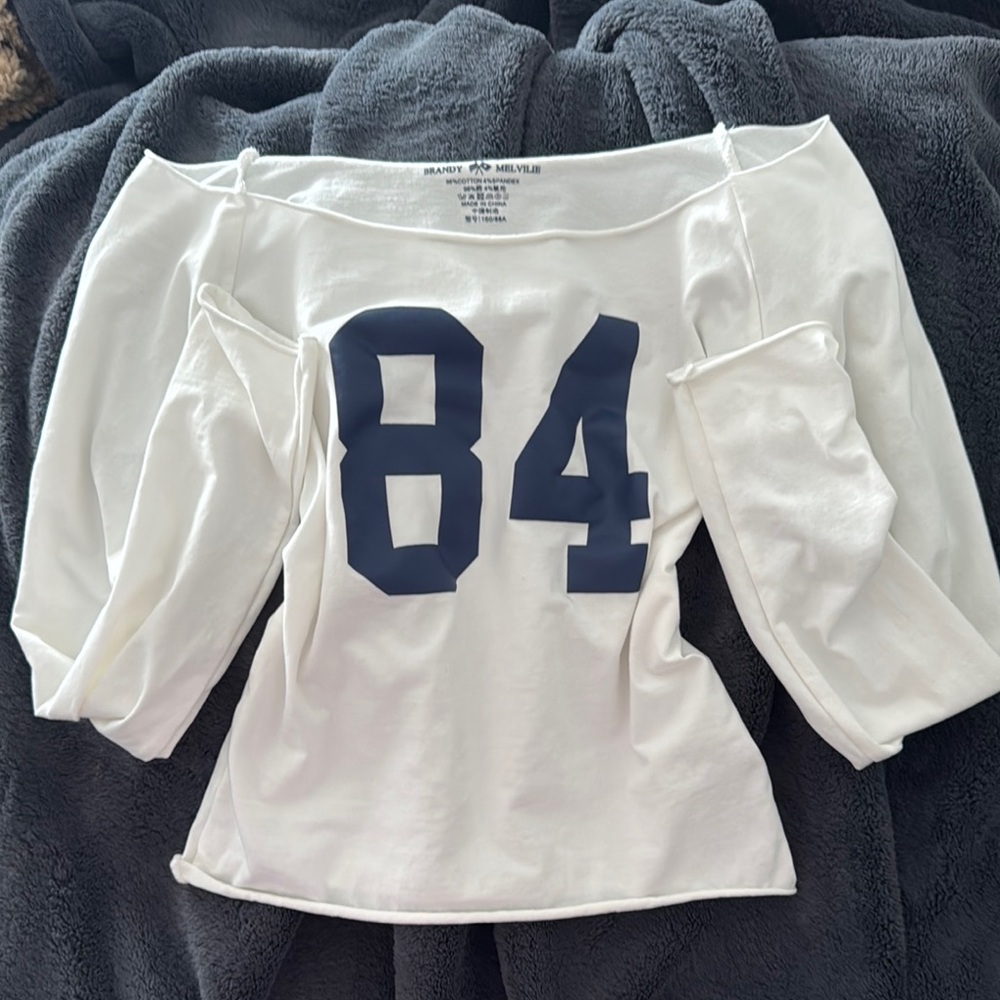 brandy melville white off shoulder “84” shirt
